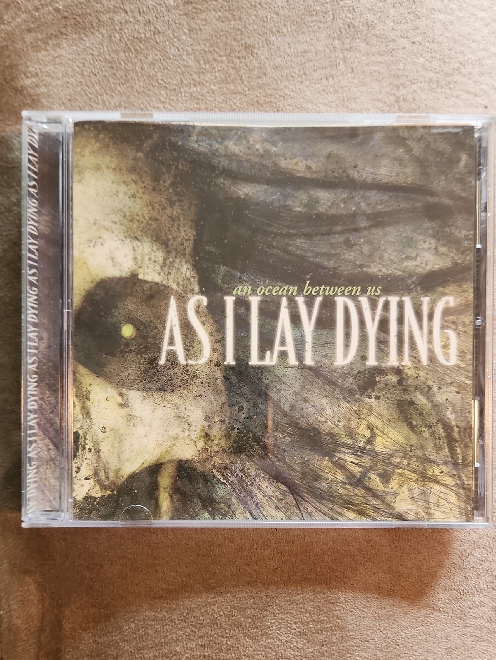 AS I LAY DYING   an ocean between us.  CD